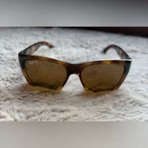 Ray-Ban RB4194 square polarized sunglasses with a Havana brown frame Read